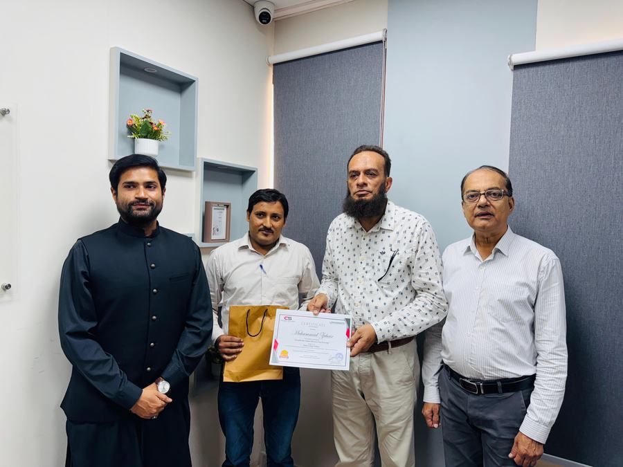 Client training session and certificate ceremony photo
