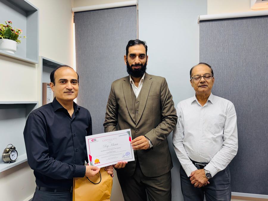 Client training session and certificate ceremony photo