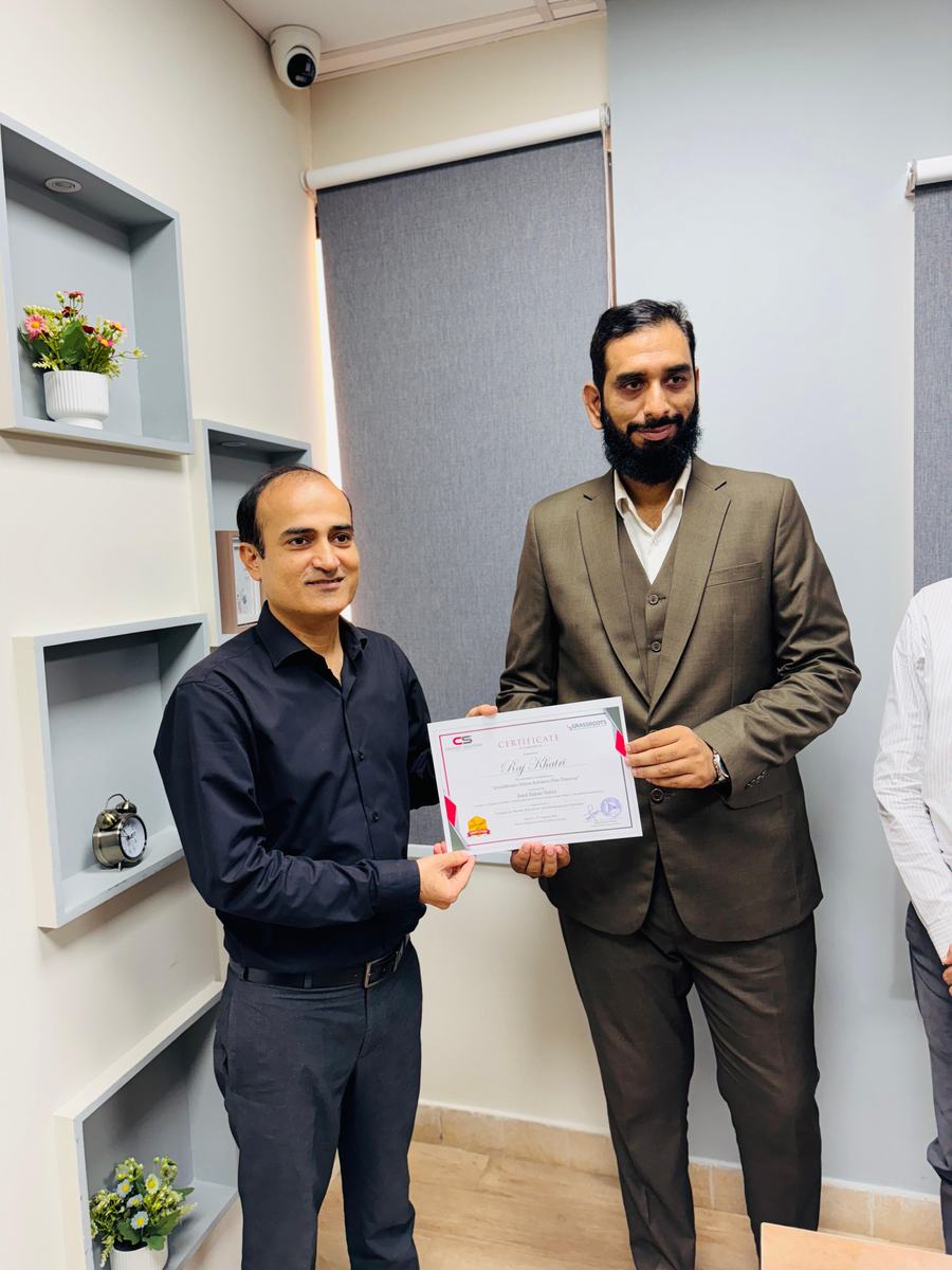 Client training session and certificate ceremony photo